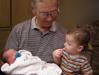 David gets his first glipse of little sister (Grandpa Sears holding him)